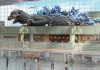 Tokyo’s Haneda airport bids travellers farewell with a colossal Godzilla installation