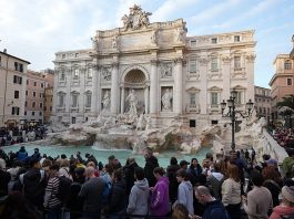 Rome tourists could have to pay to stand up near the Trevi Fountain next 12 months Rome tourists will have to pay to get up close to the Trevi Fountain next year